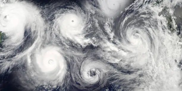 Photo of Hurricane season. Collage of a riot of hurricanes due to catastrophic climate change. Satellite view. Elements of this image furnished by NASA.