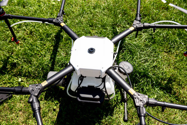 istock Professional agriculture drone on the green field 1338421897