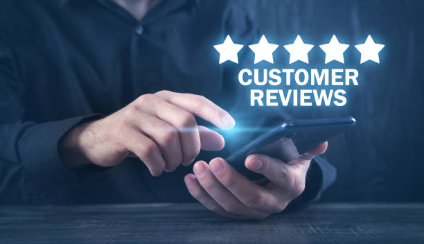 istock Man using smartphone. Customer Reviews. Business concept 1338423140