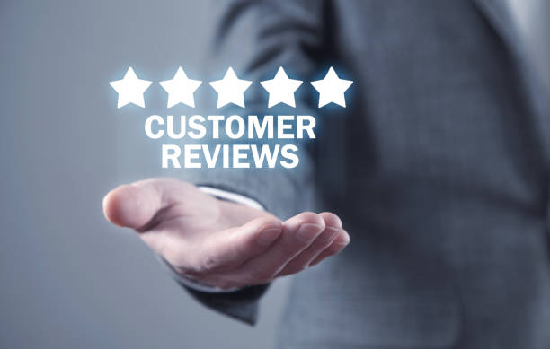istock Man holding Customer Reviews. Business concept 1338423141