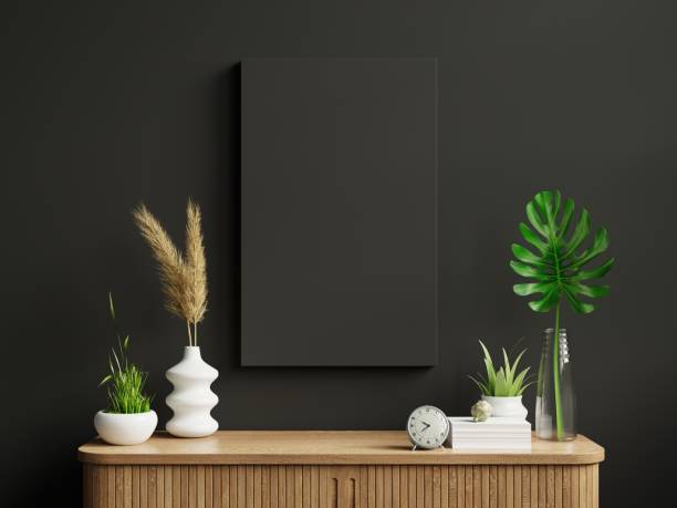 istock Mockup frame on cabinet in living room interior on empty dark wall background. 1338428201
