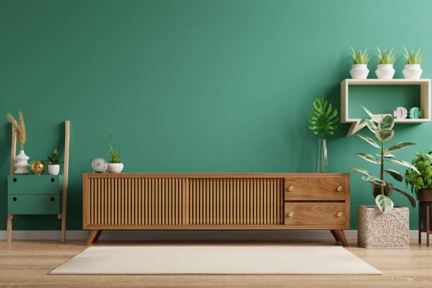 istock Shelf for tv in modern empty green room. 1338429273