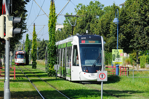 Montpellier next to the Saint-Roch station. The image shows several office and residential buildings with a Tram in the City Montpellier.