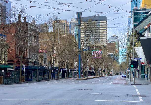 istock Empty and deserted Melbourne city street during COVID 19 lockdown on winter's day 1338436284