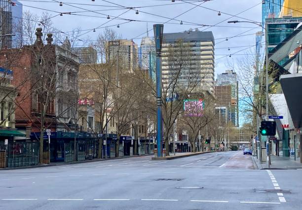 Empty and deserted Melbourne city street during COVID 19 lockdown on winter's day stock photo