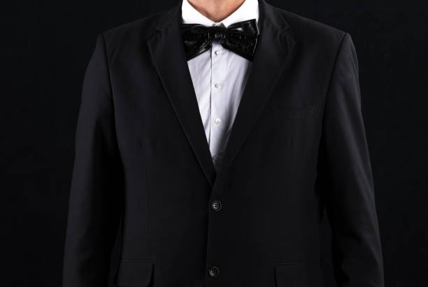 istock gentleman in black suit and bow tie 1338438364