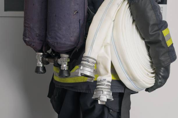 istock firefighter carries equipment for extinguishing fires, close-up 1338440728