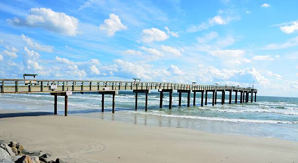 istock fishing pier on a beautiful day 133844627