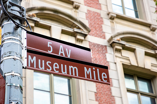 Museum Mile and Fifth Avenue sign