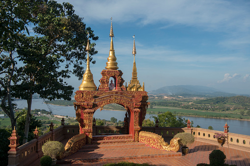 the Wat Phra Borommathat at the Temple Wat Phra That Pha Ngao in the town of Chiang Saen at the mekong River in the golden triangle in the north of the city Chiang Rai in North Thailand.   Thailand, Chiang Sean, November, 2019