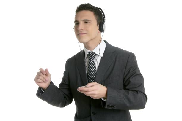 istock Handsome businessman dancing hearing music 1338453712