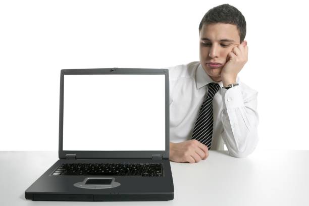istock Businessman with laptop computer, bad news 1338454051