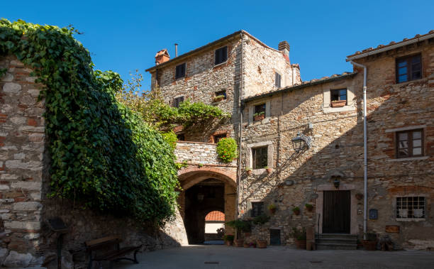 istock medieval village in Tuscany 1338458090
