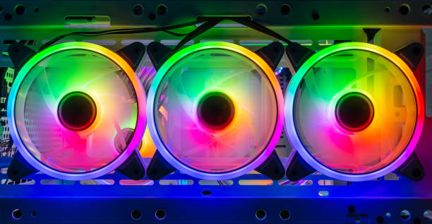 istock three colorful bright rainbow led rgb pc fan air case cooler white desktop computer chassis. gaming modding water cooling and technology concept background 1338458227