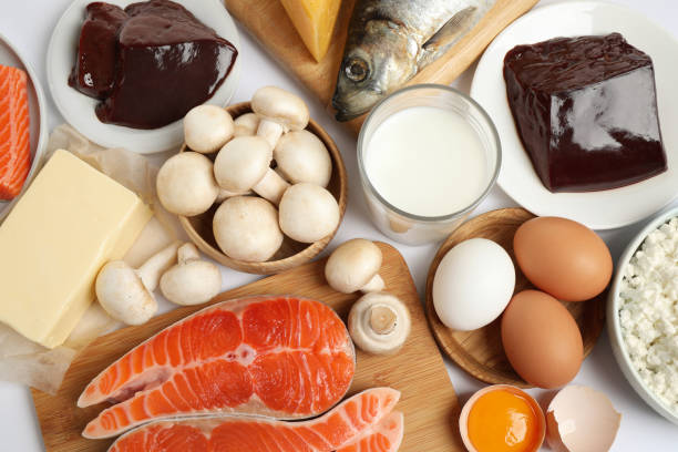 istock Fresh products rich in vitamin D on white background, top view 1338460125