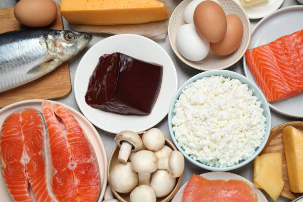 istock Fresh products rich in vitamin D on table, flat lay 1338461395