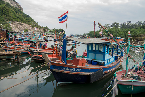 a fishingboat Harbour on the Gulf of Thailand in the Ban Laem District near the city of Phetchaburi or Phetburi in the province of Phetchaburi in Thailand.   Thailand, Phetburi, November, 2019