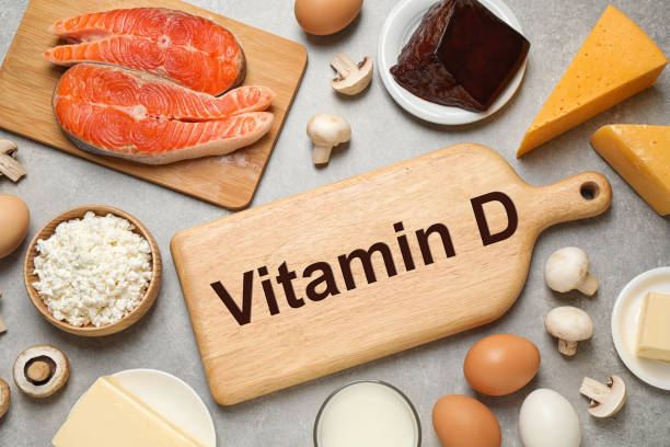 istock Fresh products rich in vitamin D on light table, flat lay. Space for text 1338461608