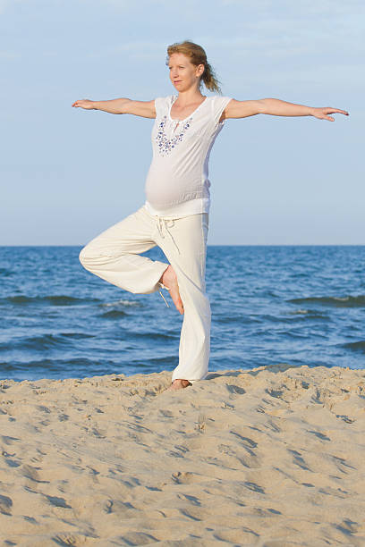 istock pregnant woman on beach 133846814