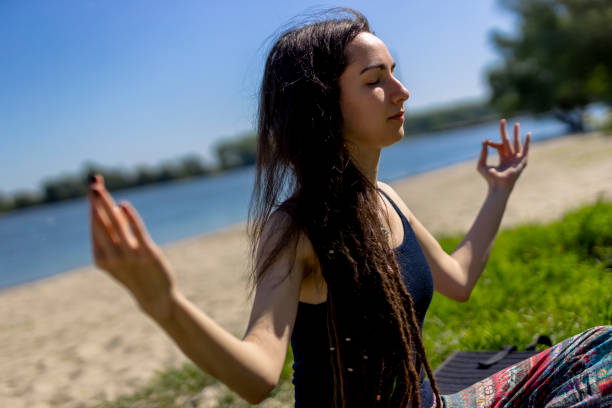 istock Yoga By The Beach 1338471961