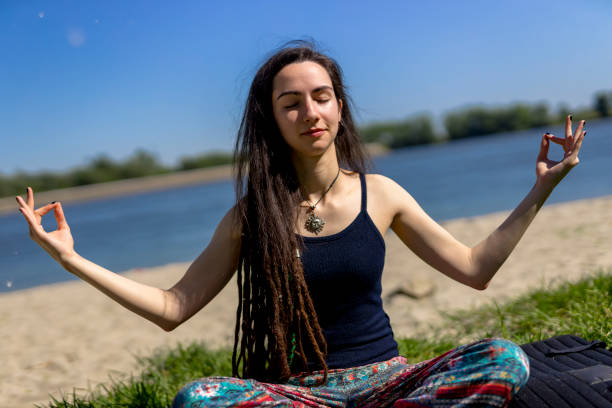 istock Yoga By The Beach 1338472540