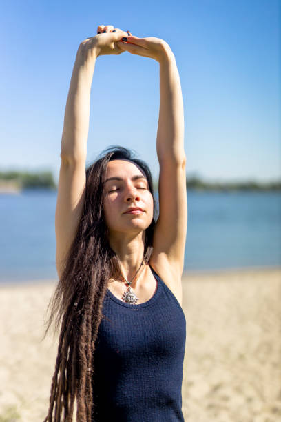 istock Yoga By The Beach 1338472668