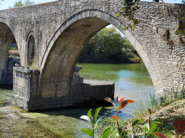 istock bridge old arched in arta city greece 1338473503