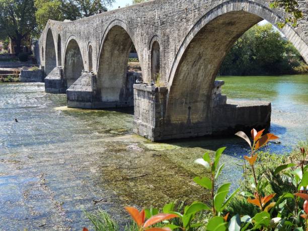istock bridge old arched in arta city greece 1338474424