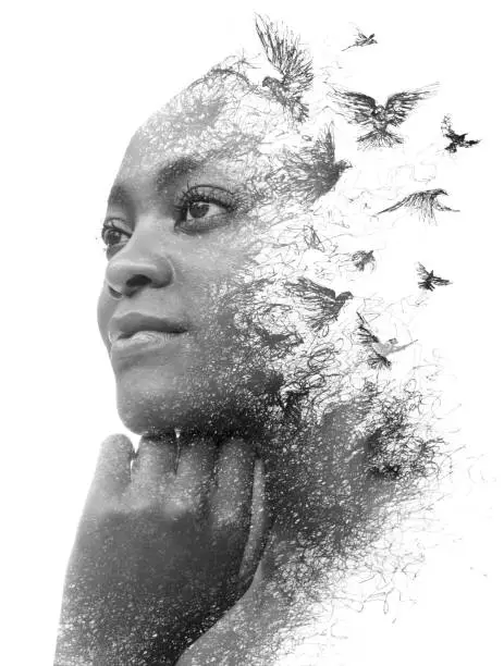 Photo of Paintography. A drawing of birds combined with a portrait of a dreaming African American woman