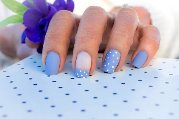 istock Purple Polka Dot Nail Art Design 1338488869