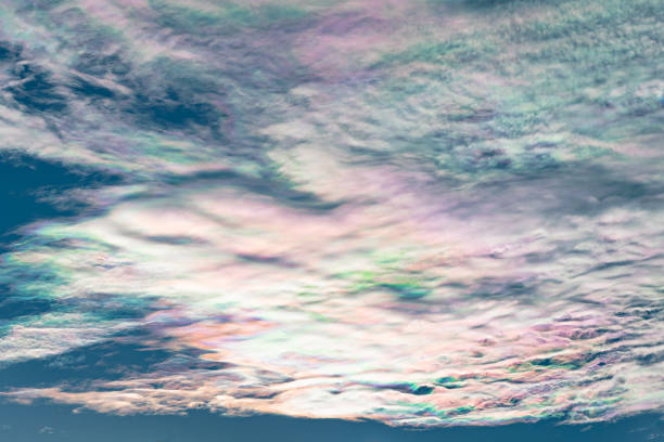 Oil colors in the clouds, a phenomenon known in meteorology as iridescence or irisation.