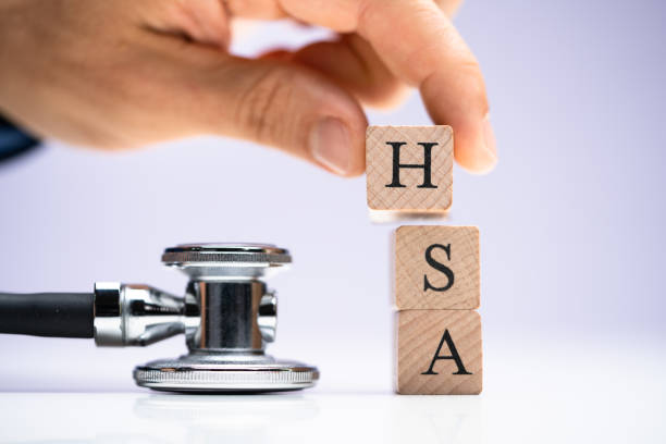 hsa health spending account. money investment - currency stethoscope medicare usa imagens e fotografias de stock