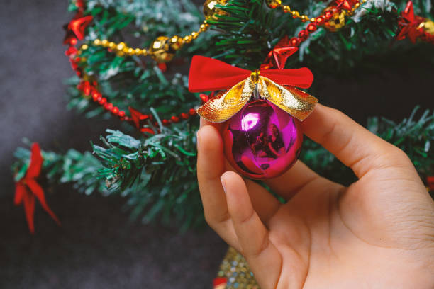 istock The christmas tree on the black background. 1338491422