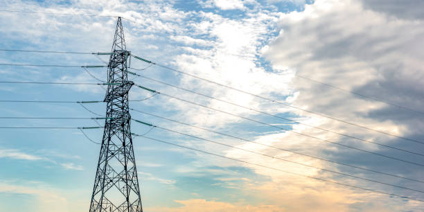 istock High voltage pillar. Power grid pole against the sky. High voltage tower. Electricity use and electricity cost concept 1338498419