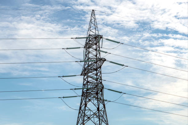 istock High voltage pillar. Power grid pole against the sky. High voltage tower. Electricity use and electricity cost concept 1338498420