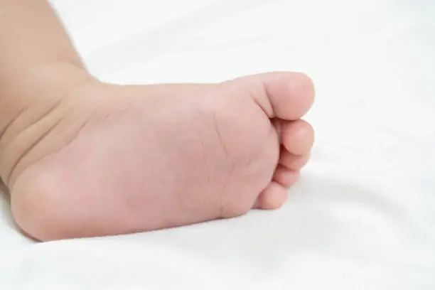 Selective focus baby's foot.health care concept.