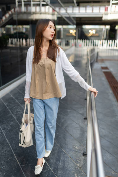 istock Young asian lady on the street 1338505497