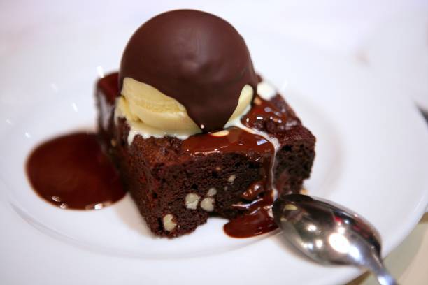 istock Delicious chocolate brownie and ice cream 1338505980