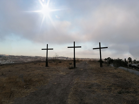 catholic crosses in mountain at sunset religious symbol. faith