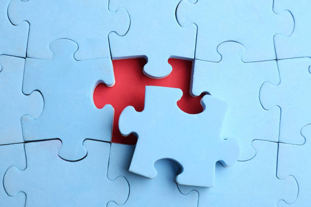 istock Light blue puzzle on red background, top view. Career promotion concept 1338506983