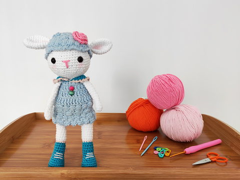 Amigurumi toy, cute little lamb soft knitted toy with knitting materials