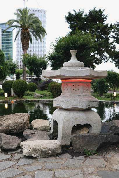 istock Stone red lantern in japanese garden. 1338516272