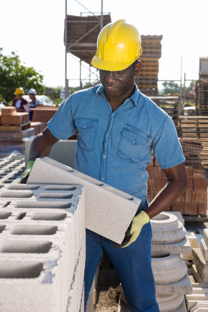 istock African american worker warehouse lays bricks 1338516973