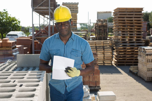 istock African american man manager, keeps records of construction materials 1338516992