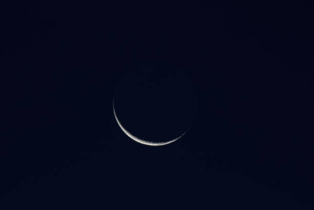 istock Waning crescent on the dark morning sky 1338517540