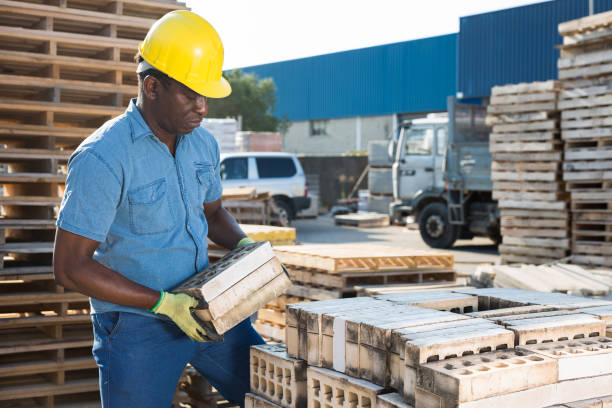 istock African american worker warehouse lays bricks 1338517722