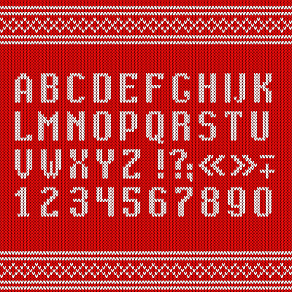 Knitted alphabet and numbers on red knitted background. Decorative Christmas poster