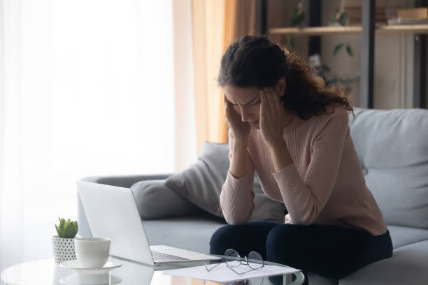 istock Young woman touch temples suffers from headache 1338521564