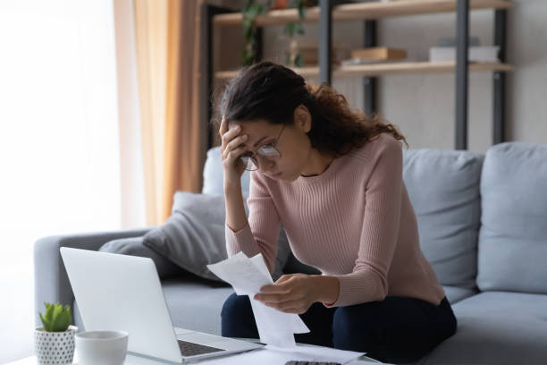 istock Woman feels desperate after expenses calculation having financial problems 1338521566