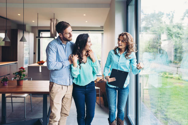 Lovely young couple choosing home